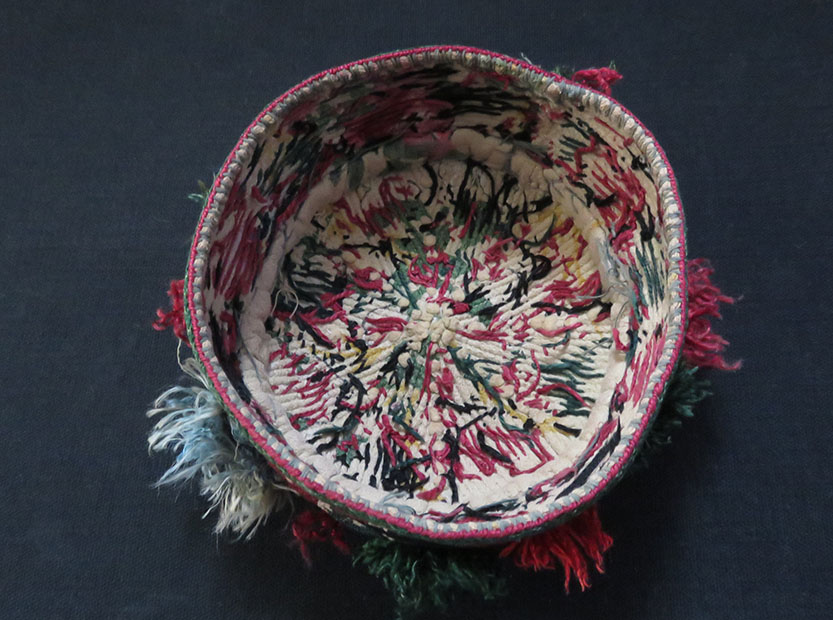 Afghanistan - tribal child hat with silk pom poms